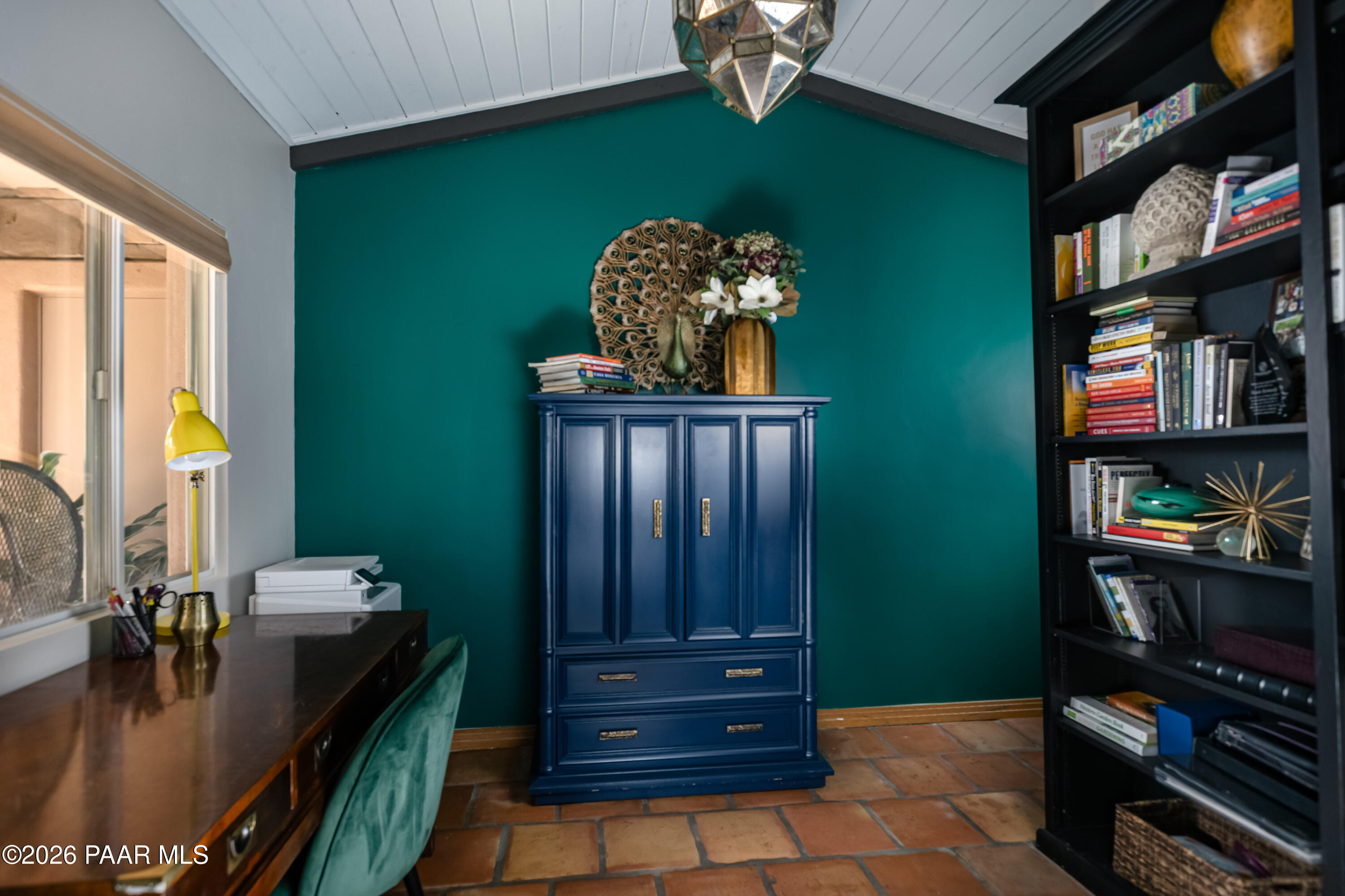 372 Verde Lane Prescott, AZ 86303 - Photo 11 of 23 a living room with furniture and a bookshelf