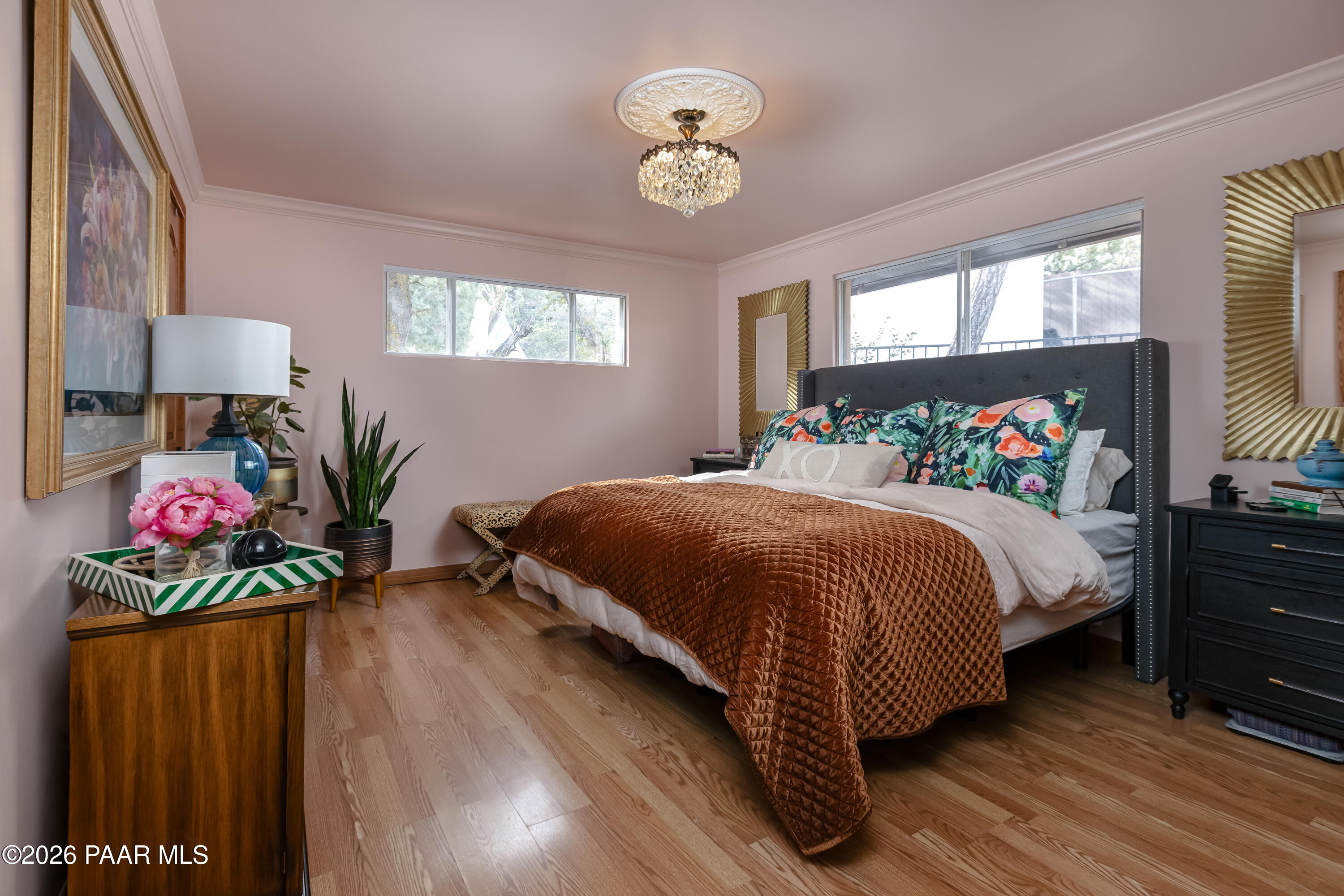 372 Verde Lane Prescott, AZ 86303 - Photo 12 of 23 a bedroom with a bed and a potted plant