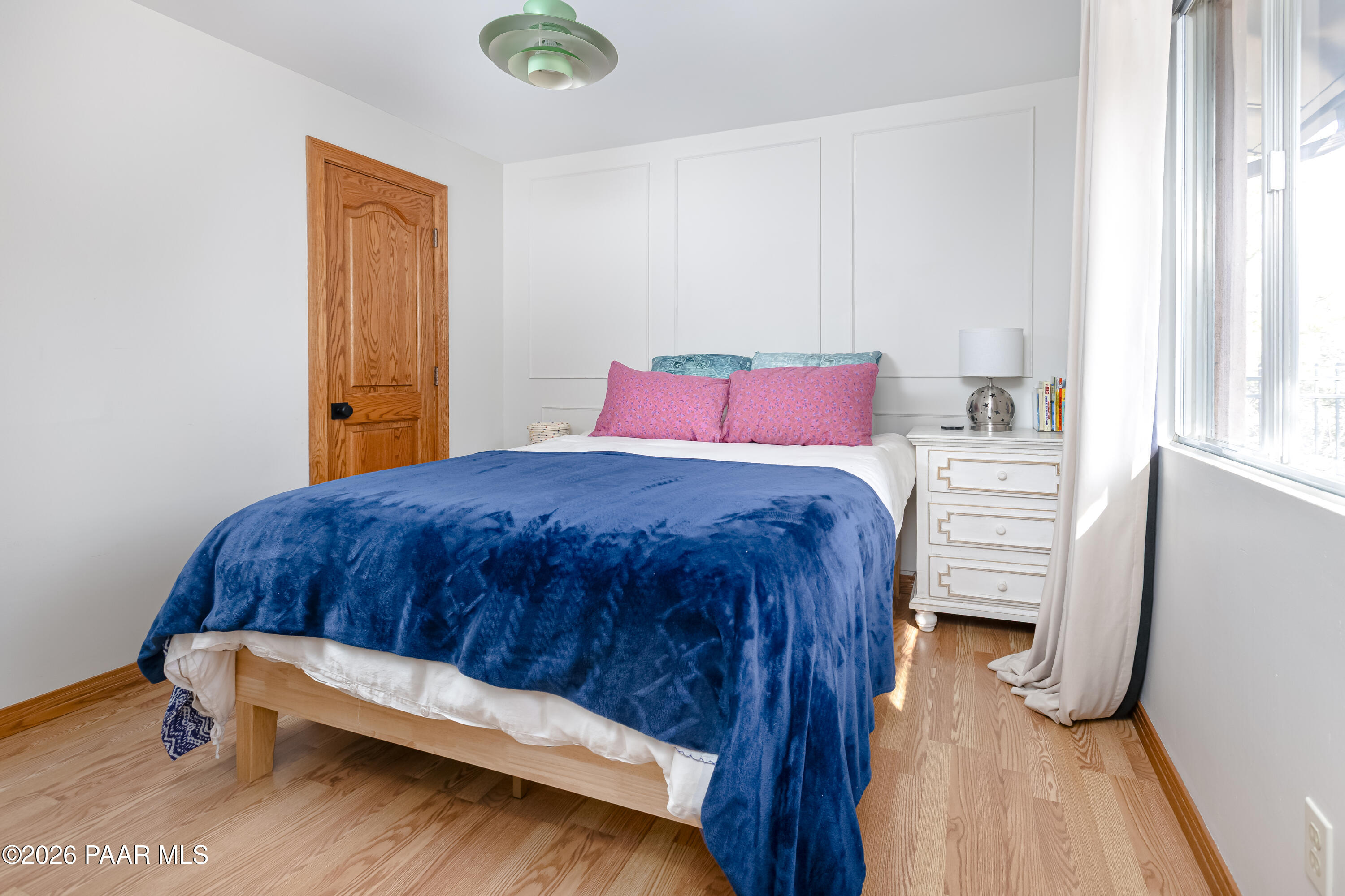 372 Verde Lane Prescott, AZ 86303 - Photo 15 of 23 a bedroom with a bed and a dresser