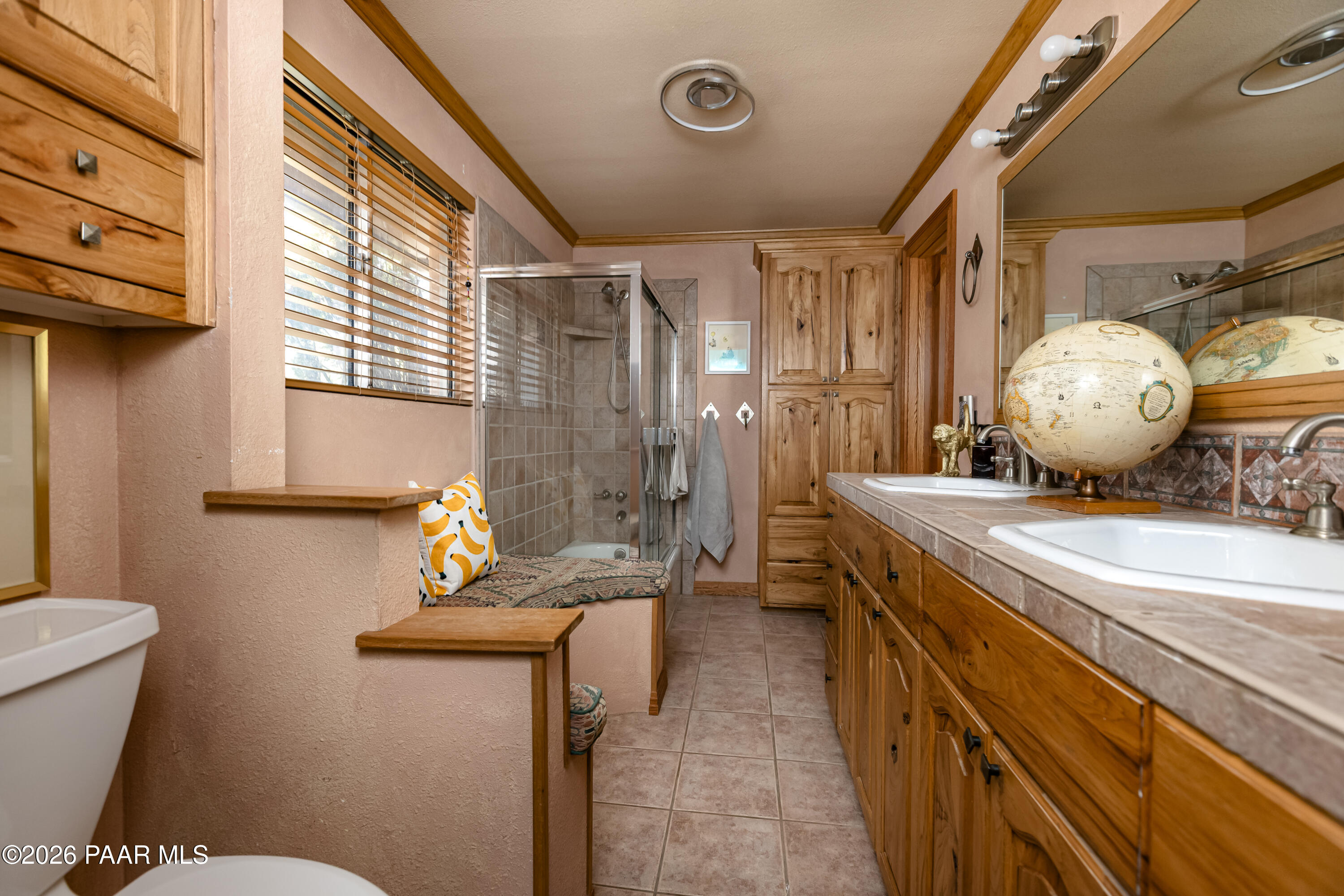 372 Verde Lane Prescott, AZ 86303 - Photo 17 of 23 a bathroom with a sink a toilet and shower