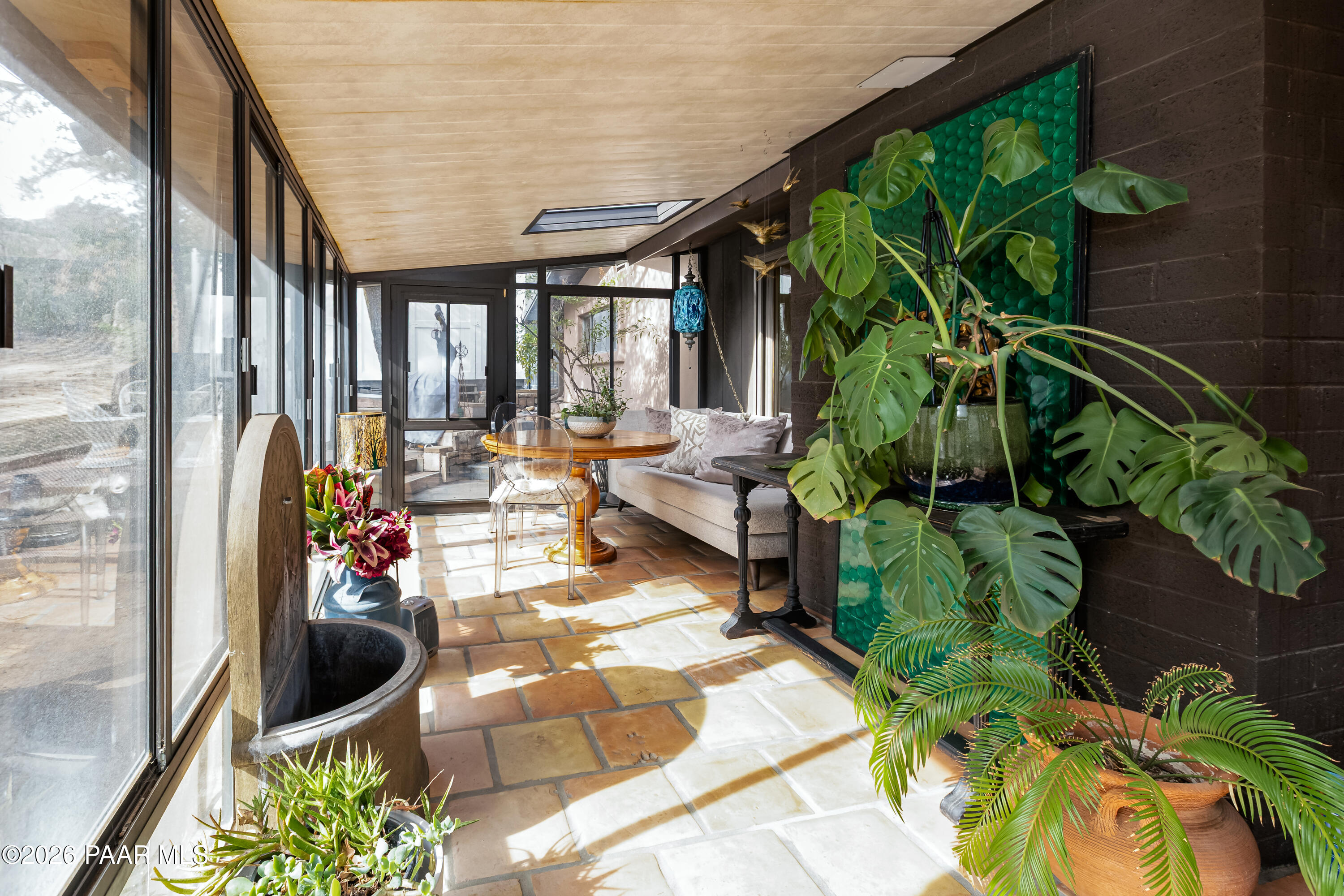 372 Verde Lane Prescott, AZ 86303 - Photo 19 of 23 a view of a patio with table and chairs potted plants