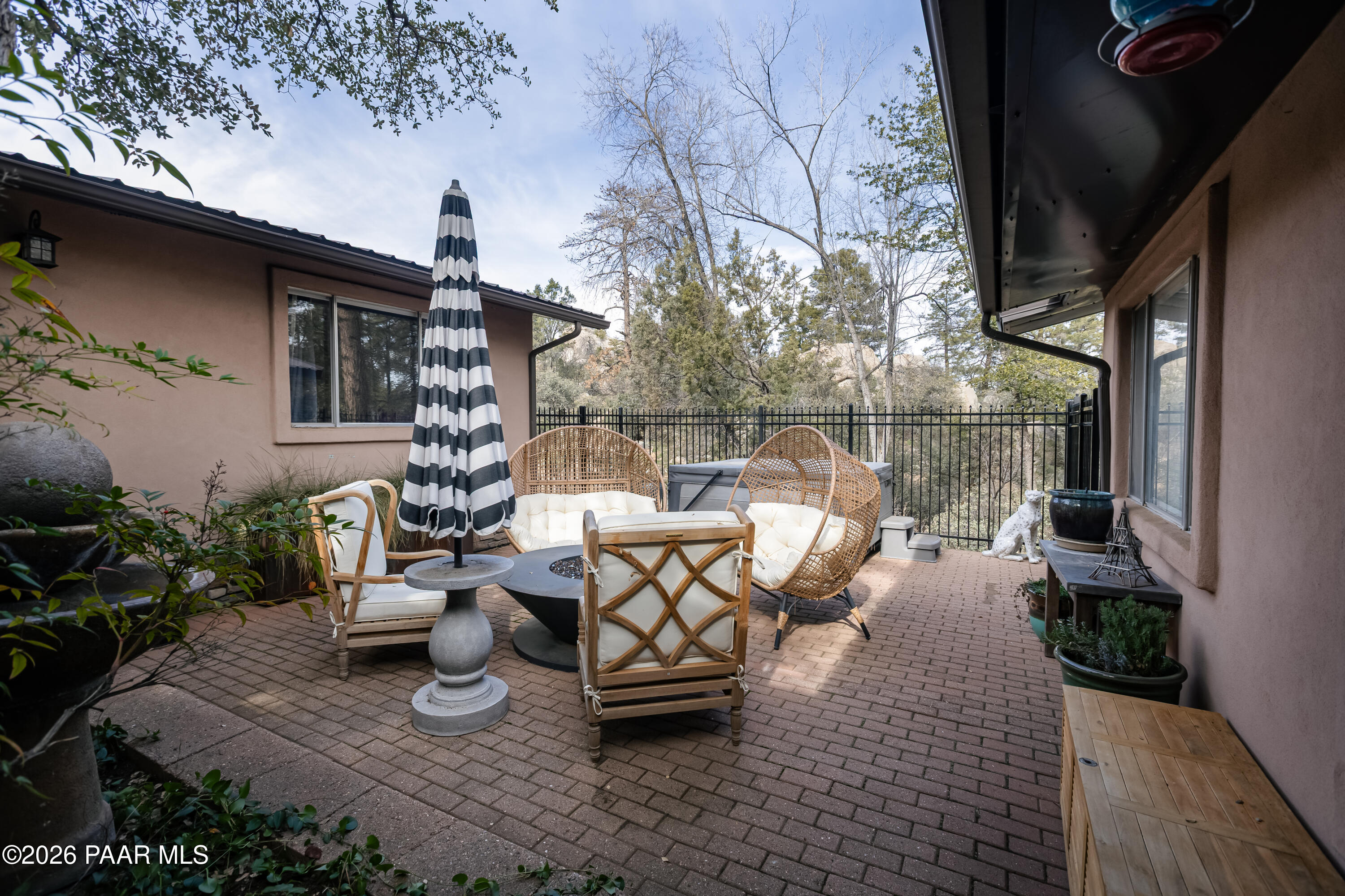 372 Verde Lane Prescott, AZ 86303 - Photo 20 of 23 a backyard of a house with outdoor seating