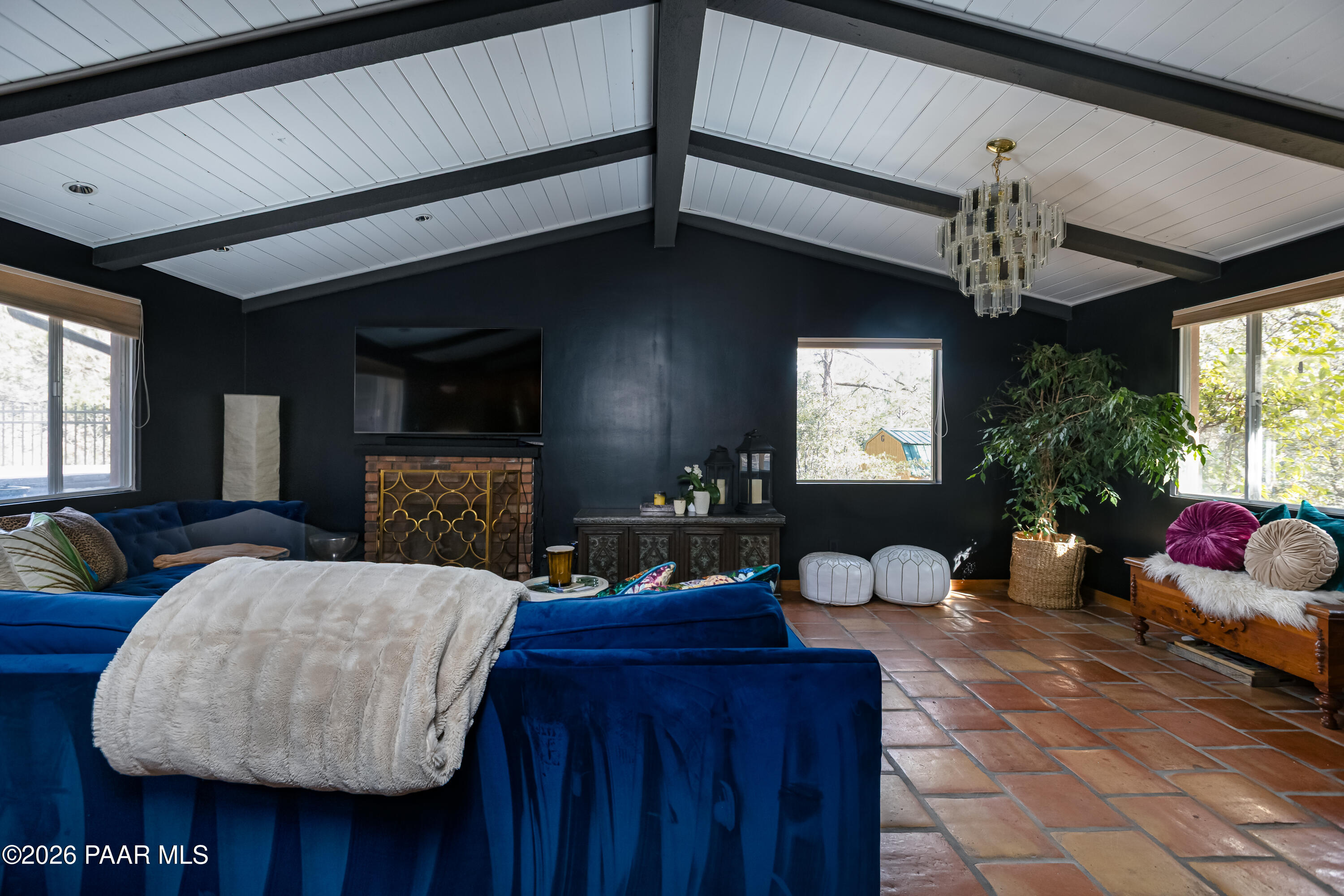 372 Verde Lane Prescott, AZ 86303 - Photo 5 of 23 a living room with furniture a chandelier and a window