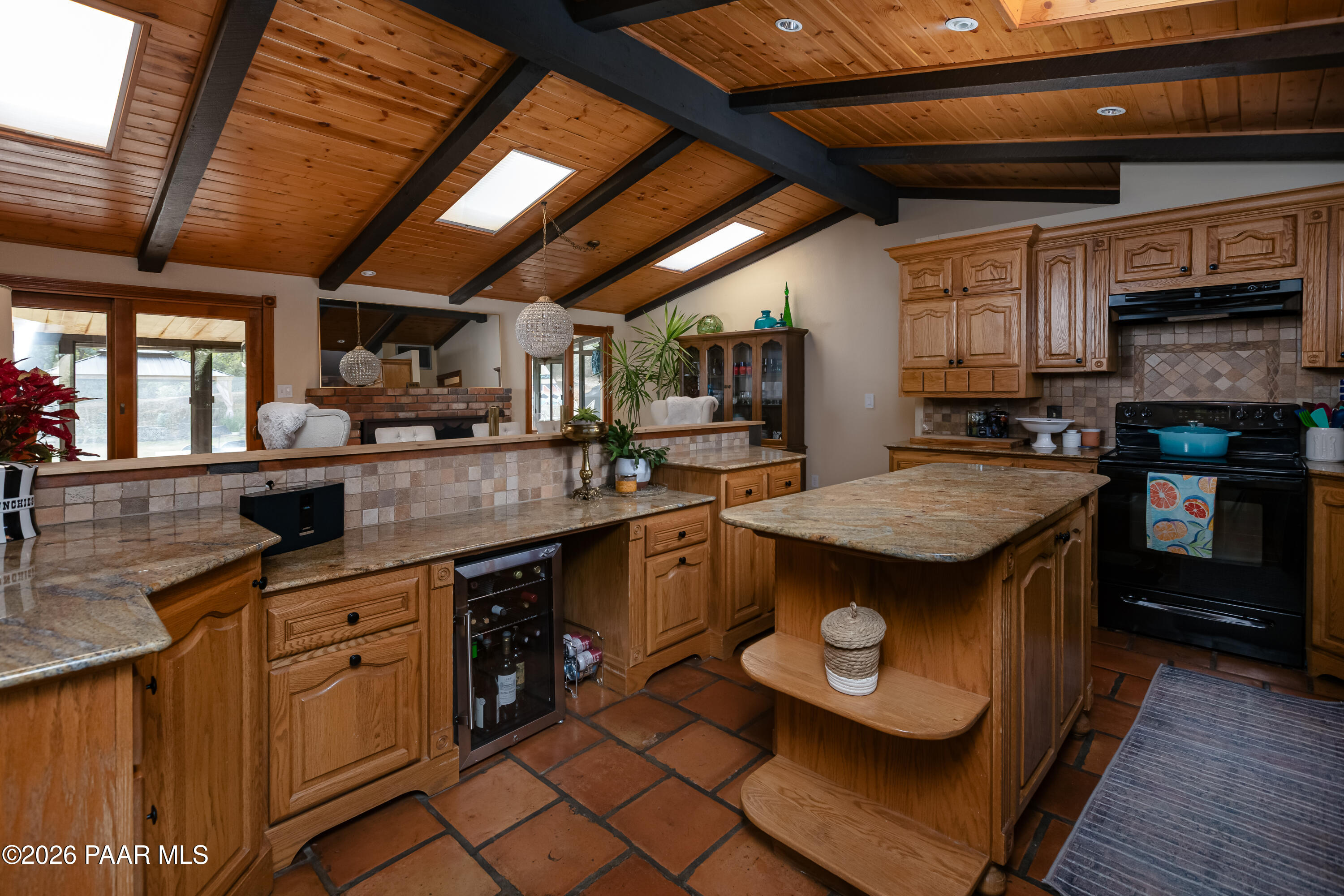 372 Verde Lane Prescott, AZ 86303 - Photo 9 of 23 a kitchen with stainless steel appliances granite countertop a sink a stove and cabinets
