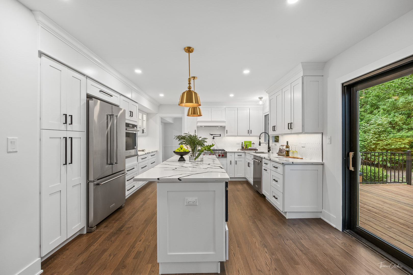 27036 West Miller Road Lake Barrington, IL 60010 - Photo 12 of 52 a kitchen with white cabinets and stainless steel appliances