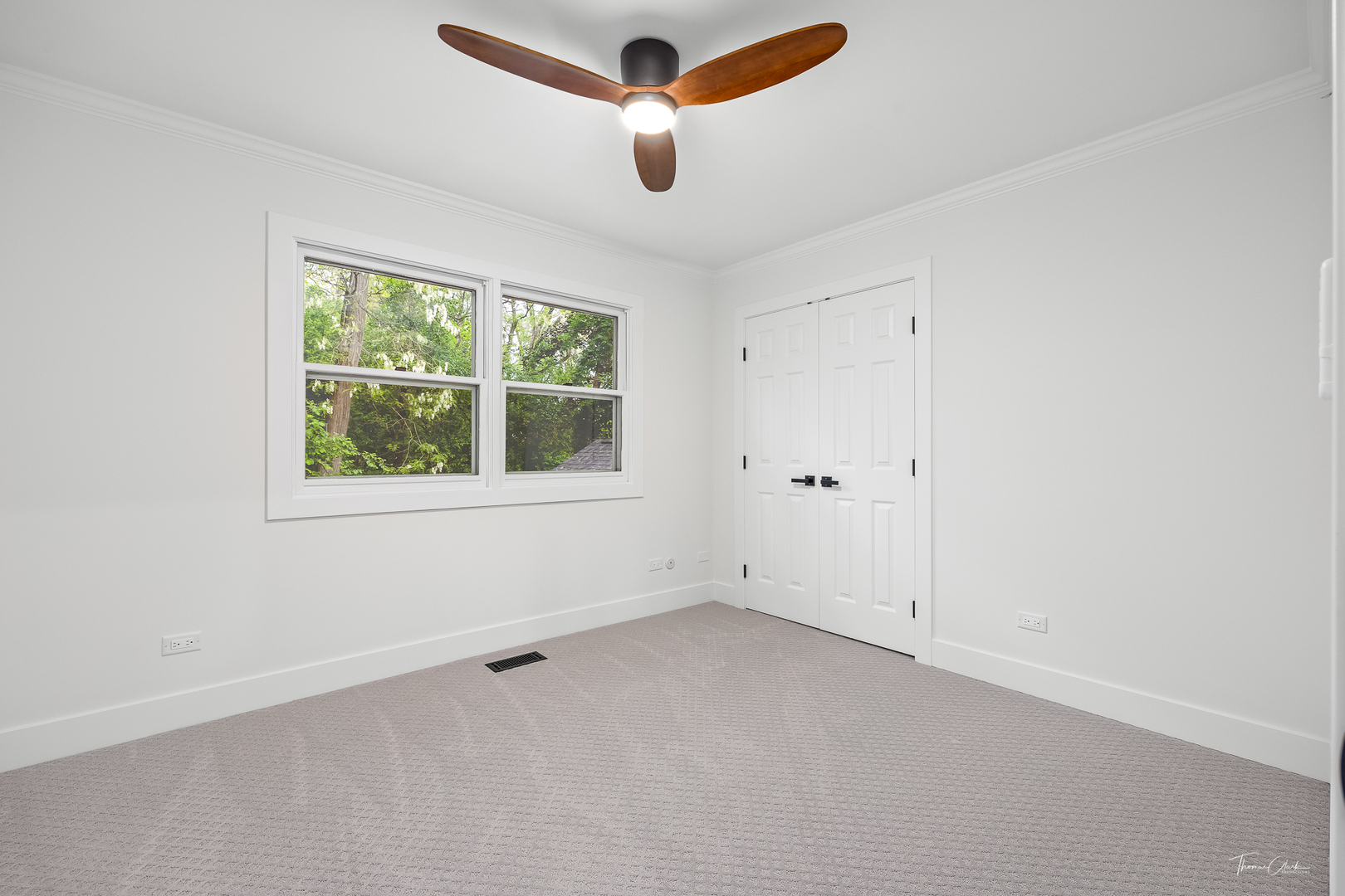 27036 West Miller Road Lake Barrington, IL 60010 - Photo 26 of 52 an empty room with a window and a ceiling fan