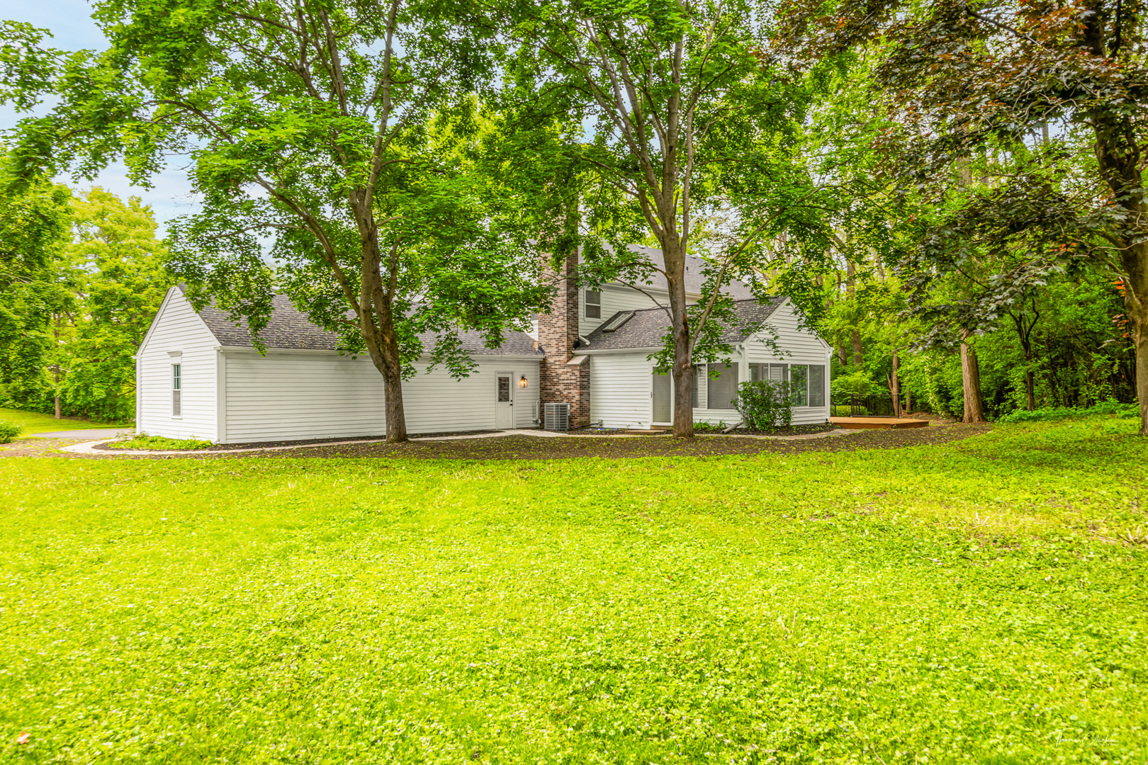 27036 West Miller Road Lake Barrington, IL 60010 - Photo 44 of 52 a view of a house with a yard and tree