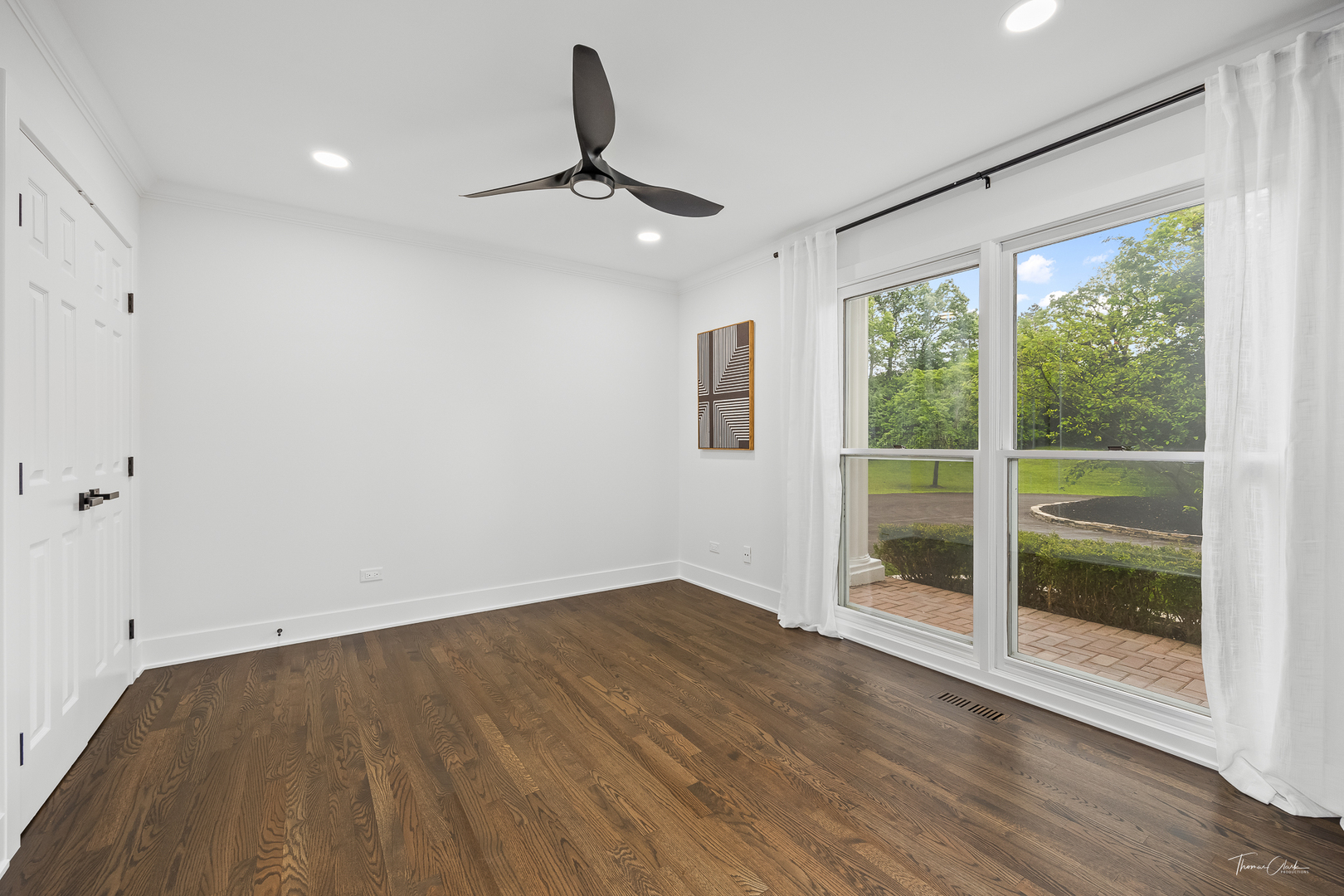 27036 West Miller Road Lake Barrington, IL 60010 - Photo 7 of 52 a view of empty room with wooden floor and fan
