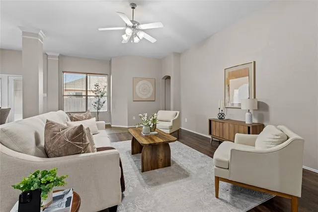 a living room with furniture and window