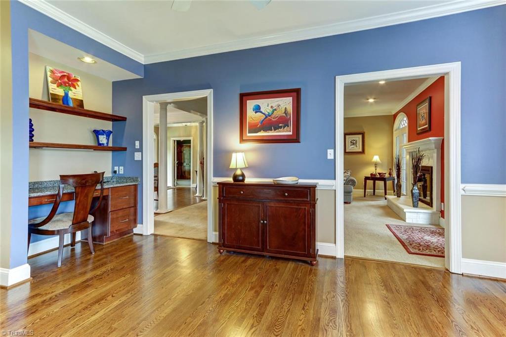 5203 Red Fox Drive Oak Ridge, NC 27310 - Photo 13 of 30 Note the built-n desk and work area. For those who would want a more open view of the great room, the wall in the center could be partially taken out.