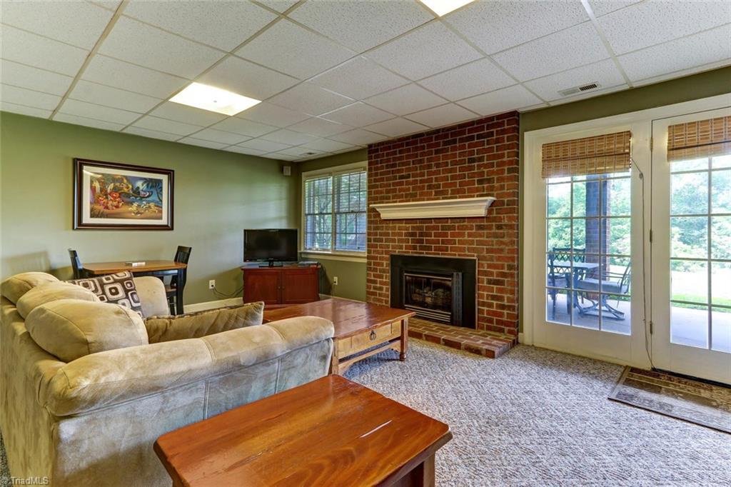 5203 Red Fox Drive Oak Ridge, NC 27310 - Photo 21 of 30 A special feature of this home is the walk-out basement. Here you will find a complete in-law or "bounce-back" child suite with its own private lounge area.