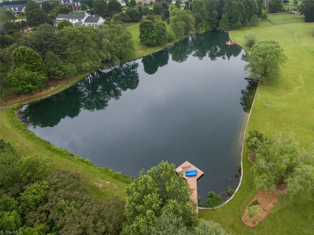5203 Red Fox Drive Oak Ridge, NC 27310 - Photo 29 of 30 An aerial view of the lake and pier.