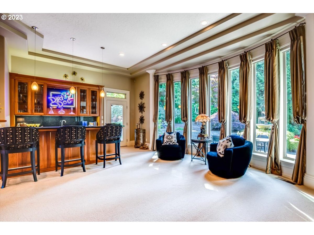 1531 Southeast 26th Drive Gresham, OR 97080 - Photo 15 of 44 a living room with furniture and a flat screen tv