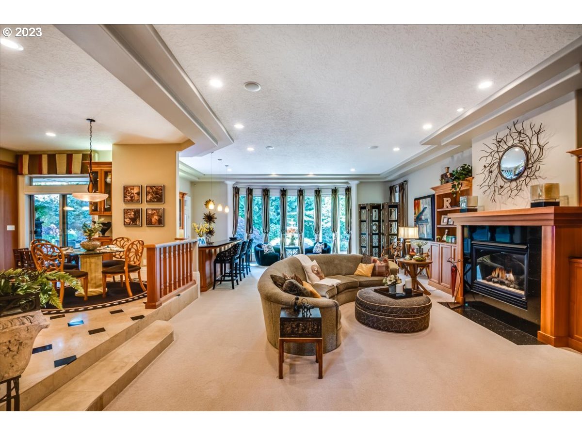 1531 Southeast 26th Drive Gresham, OR 97080 - Photo 18 of 44 a living room with furniture a fireplace and a window