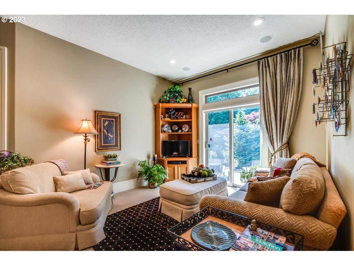 1531 Southeast 26th Drive Gresham, OR 97080 - Photo 21 of 44 a living room with furniture and a large window