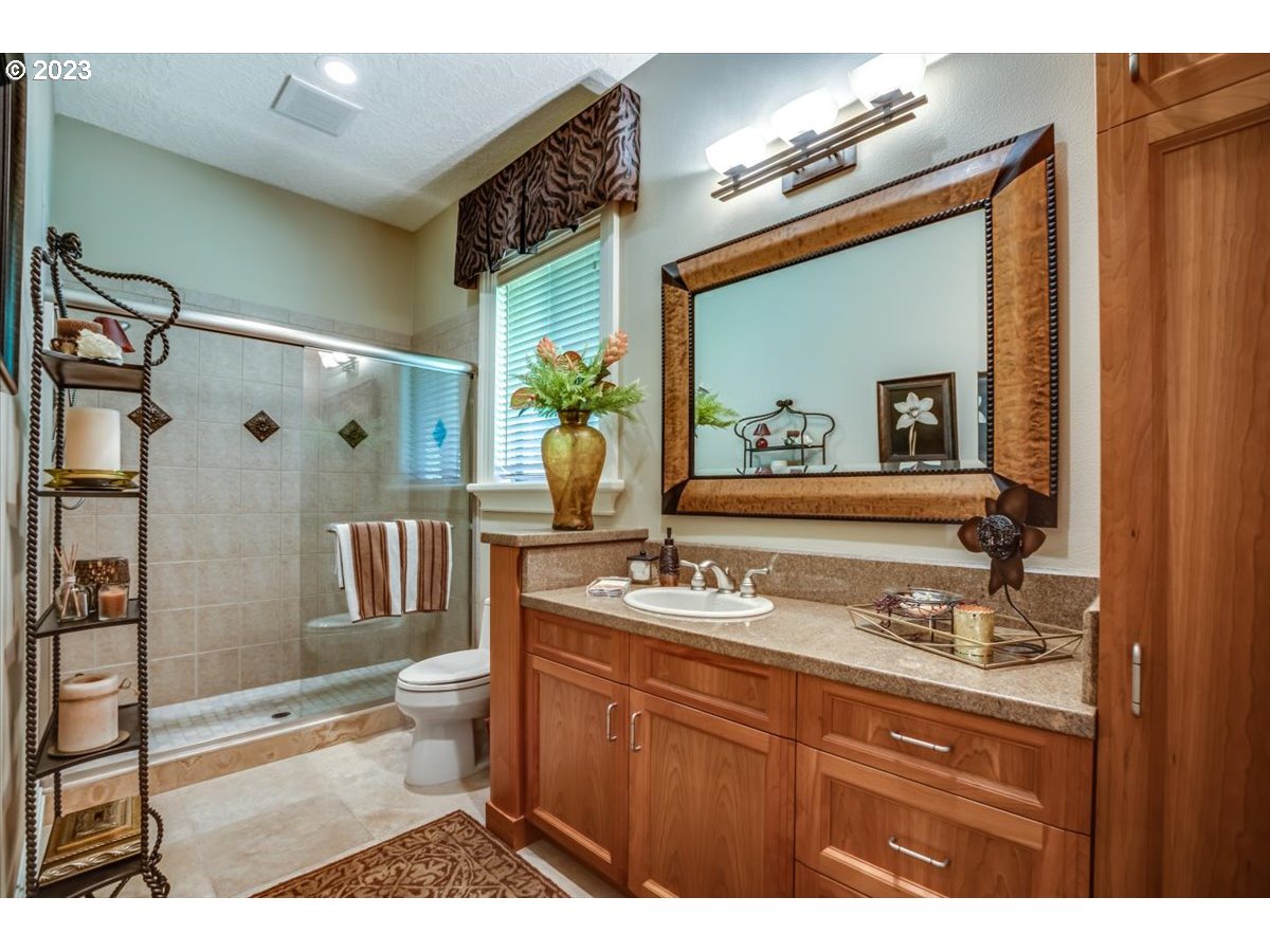 1531 Southeast 26th Drive Gresham, OR 97080 - Photo 22 of 44 a bathroom with a sink and a mirror