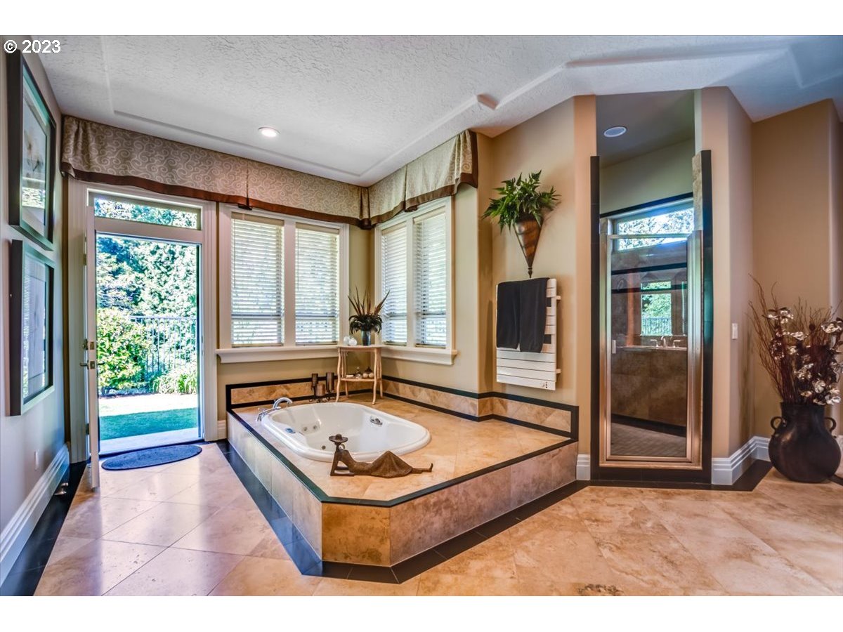 1531 Southeast 26th Drive Gresham, OR 97080 - Photo 33 of 44 a living room with couch pool table and windows