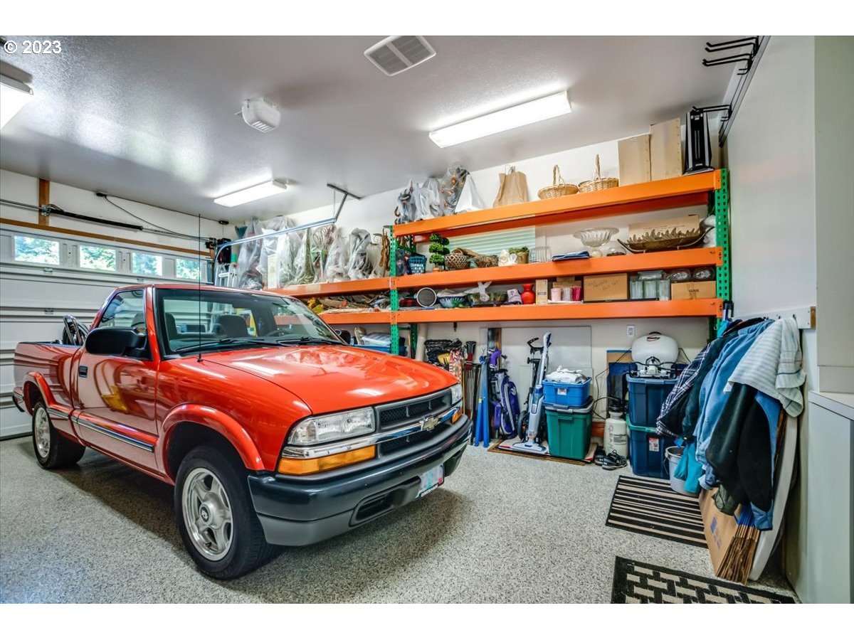 1531 Southeast 26th Drive Gresham, OR 97080 - Photo 36 of 44 a car parked in a garage