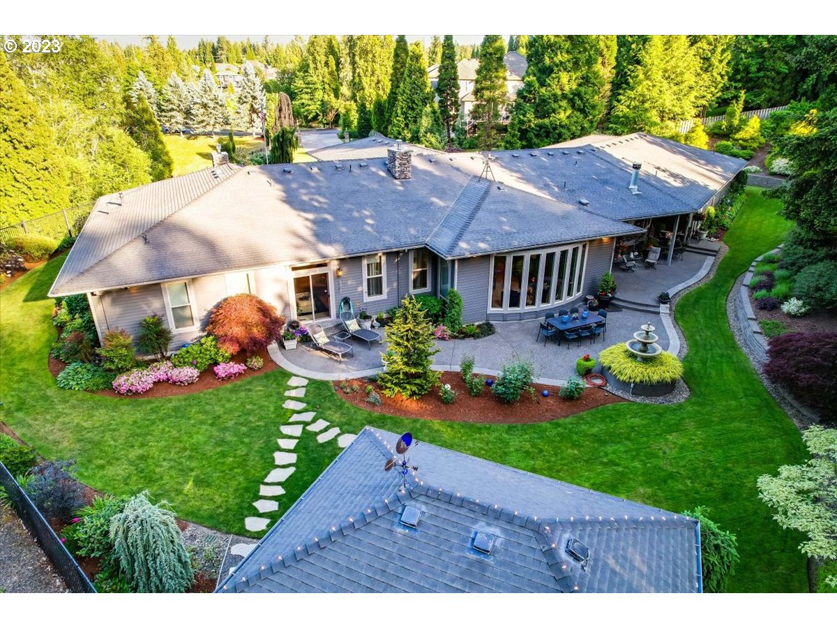 1531 Southeast 26th Drive Gresham, OR 97080 - Photo 43 of 44 a view of a house with garden and a yard