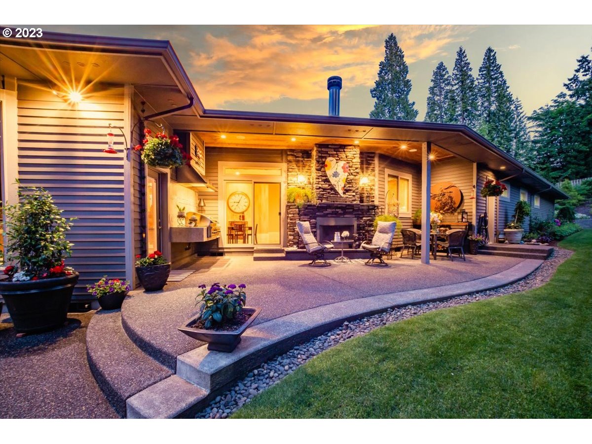 1531 Southeast 26th Drive Gresham, OR 97080 - Photo 9 of 44 a view of a porch with furniture and a yard
