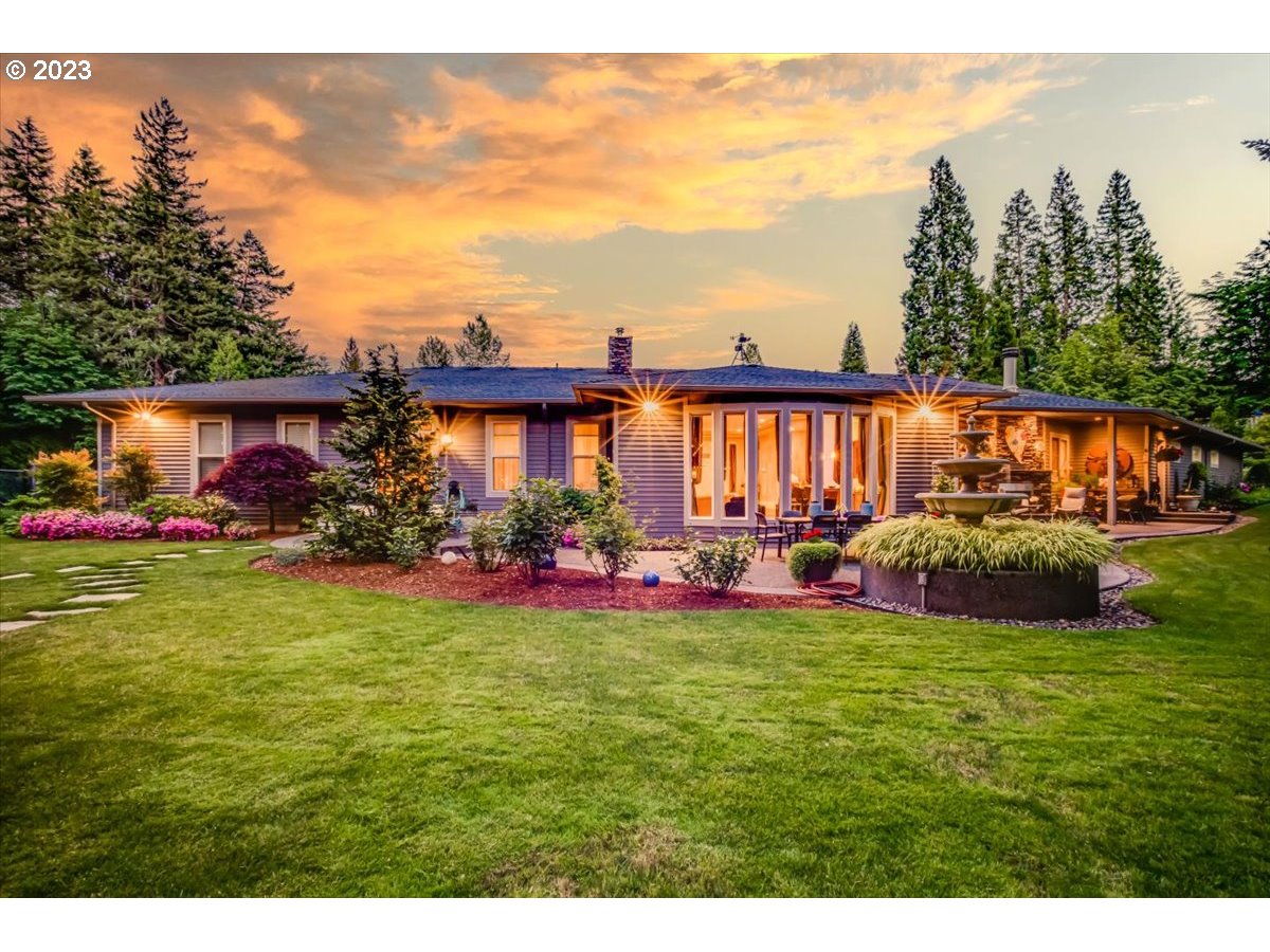 1531 Southeast 26th Drive Gresham, OR 97080 - Photo 10 of 44 a view of a house with a big yard and potted plants