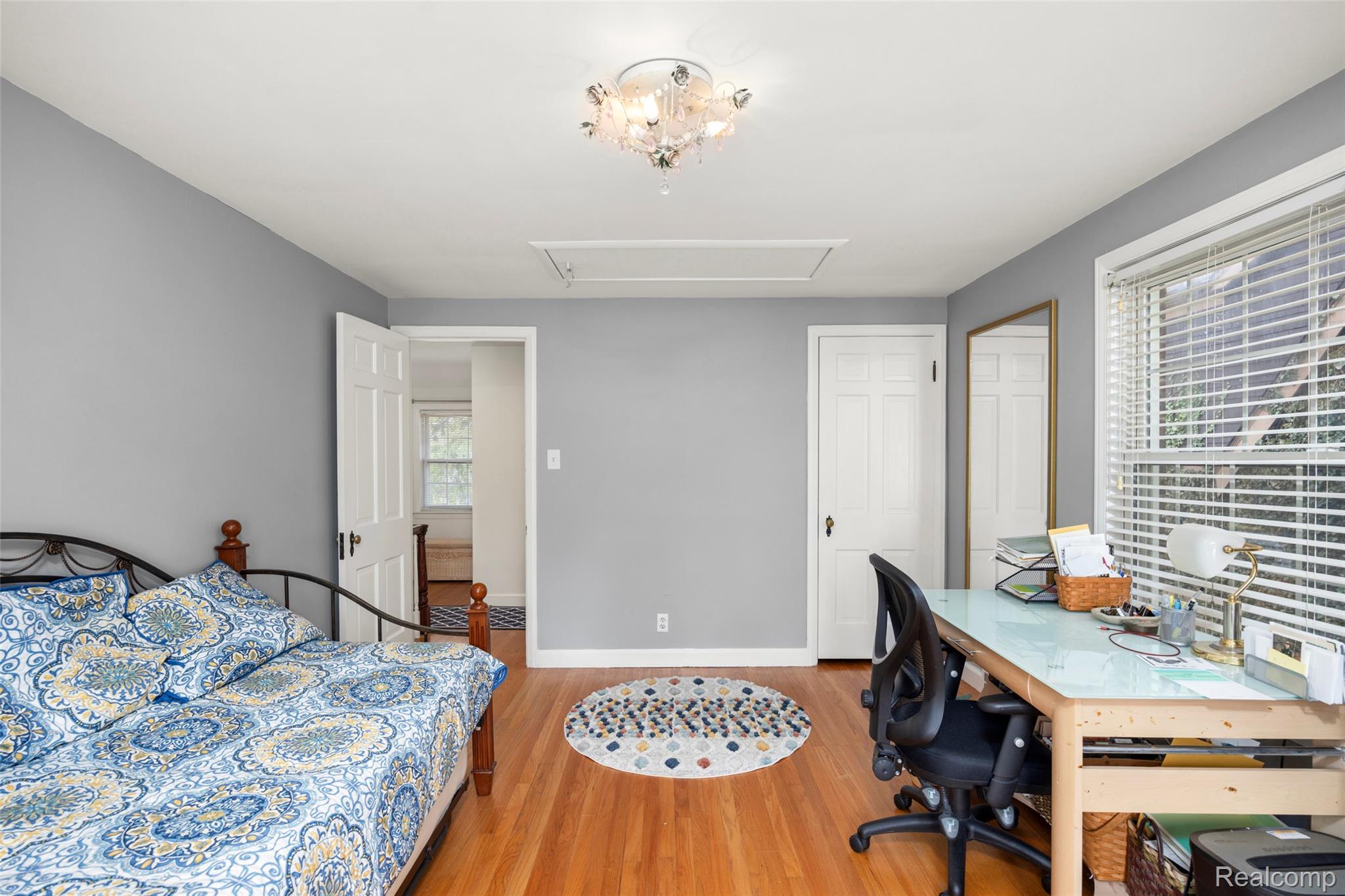 244 Kerby Road Grosse Pointe, MI 48236 - Photo 33 of 53 Bedroom featuring light wood-style floors and a desk