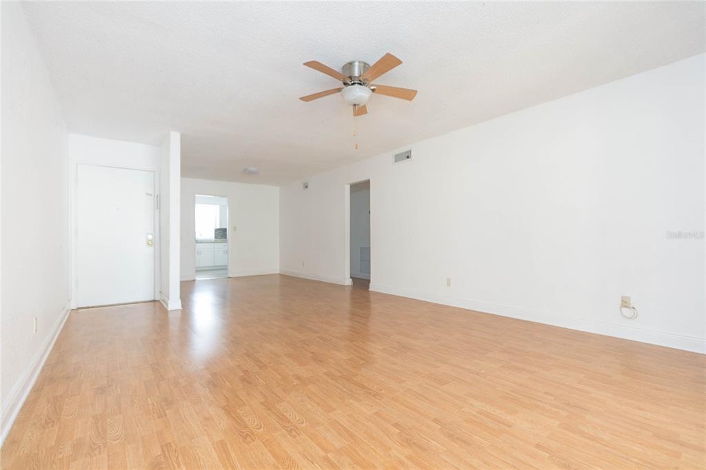 7531 Abonado Road, Unit 1 Tampa, FL 33615 - Photo 7 of 26 a view of an empty room with a ceiling fan