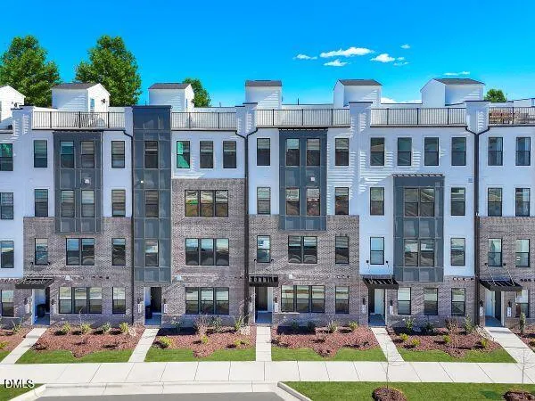 a view of front red brick building