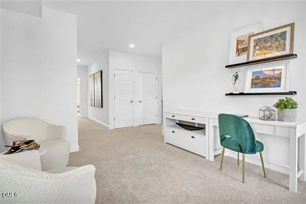 a view of a storage and utility room with washer and dryer