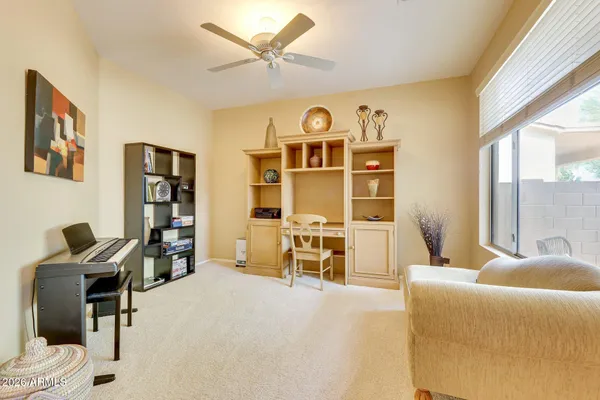 a view of a livingroom with furniture and windows