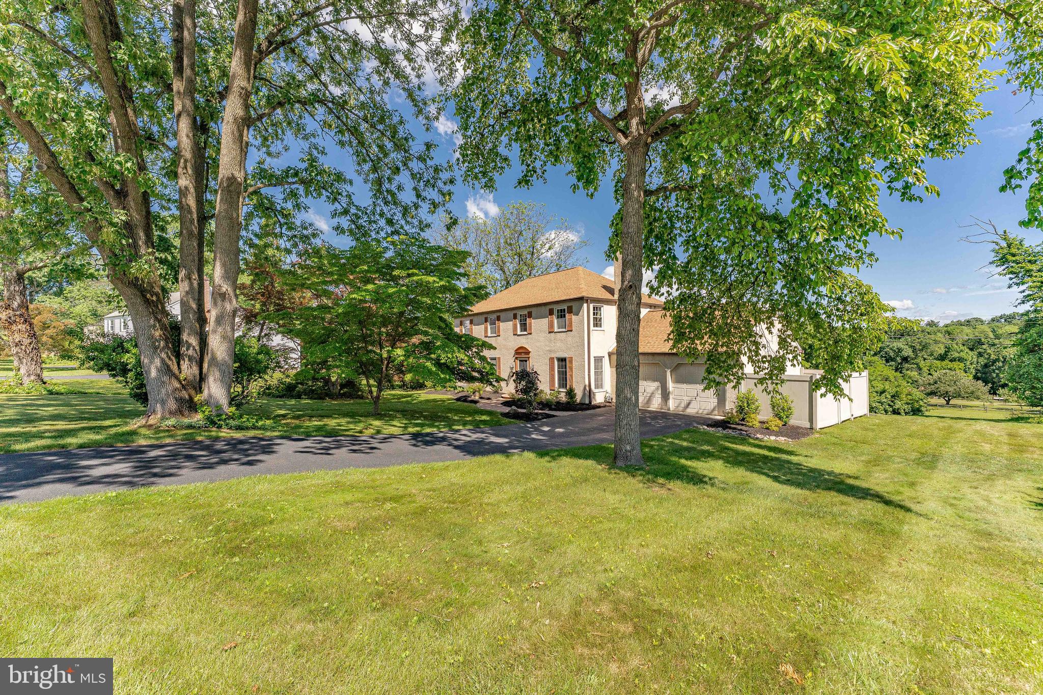 84 North Spring Lane Phoenixville, PA 19460 - Photo 1 of 51 a view of a house with a tree and yard