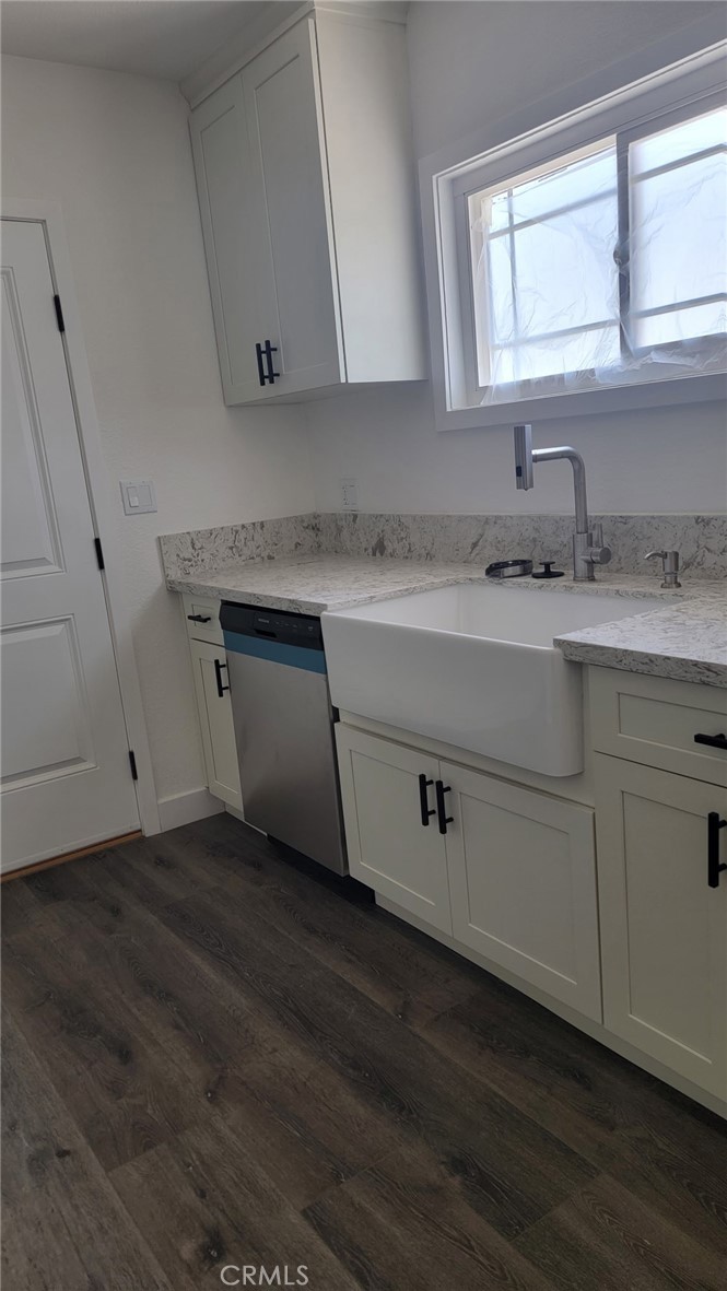 880 South State Street Hemet, CA 92543 - Photo 12 of 21 a kitchen with a sink cabinets and a window