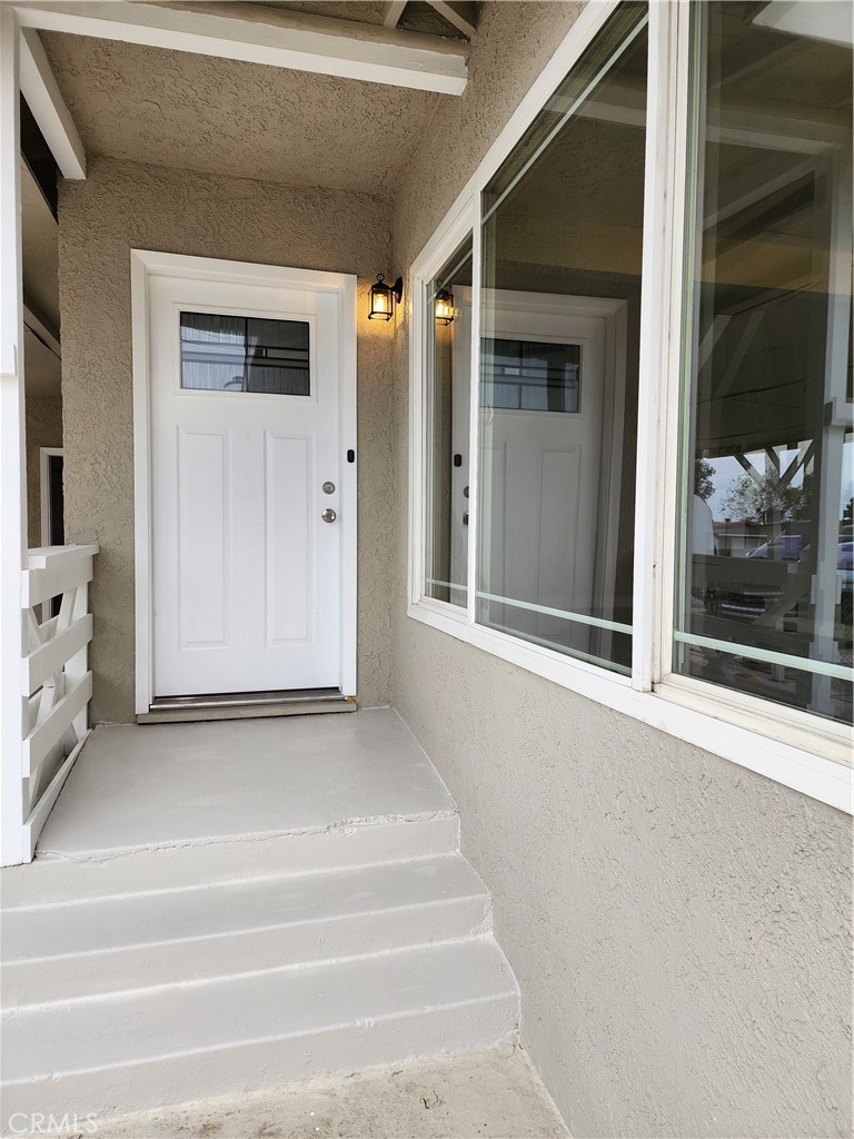 880 South State Street Hemet, CA 92543 - Photo 2 of 21 a view of a entryway door of the house