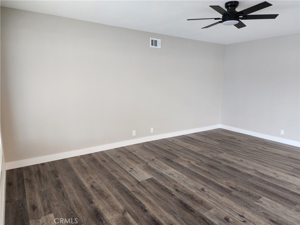 880 South State Street Hemet, CA 92543 - Photo 5 of 21 a view of a room with wooden floor
