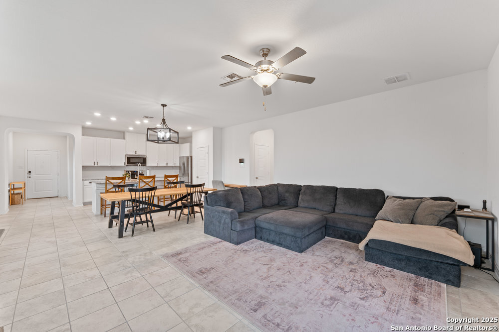 3404 Taurus Sky Converse, TX 78109 - Photo 11 of 27 a living room with furniture and kitchen view