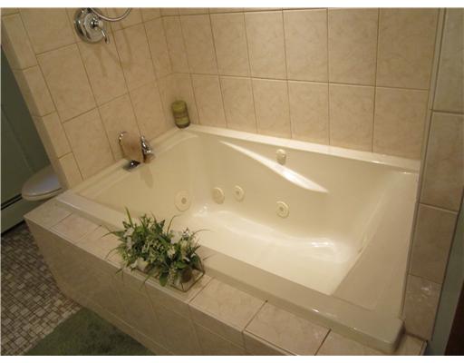 4 Don Gay Road Smithfield, RI 02917 - Photo 11 of 19 Bathroom. beautiful new bath with oversized jacuzzi, also has custom heater to keep water warm for long periods of time.