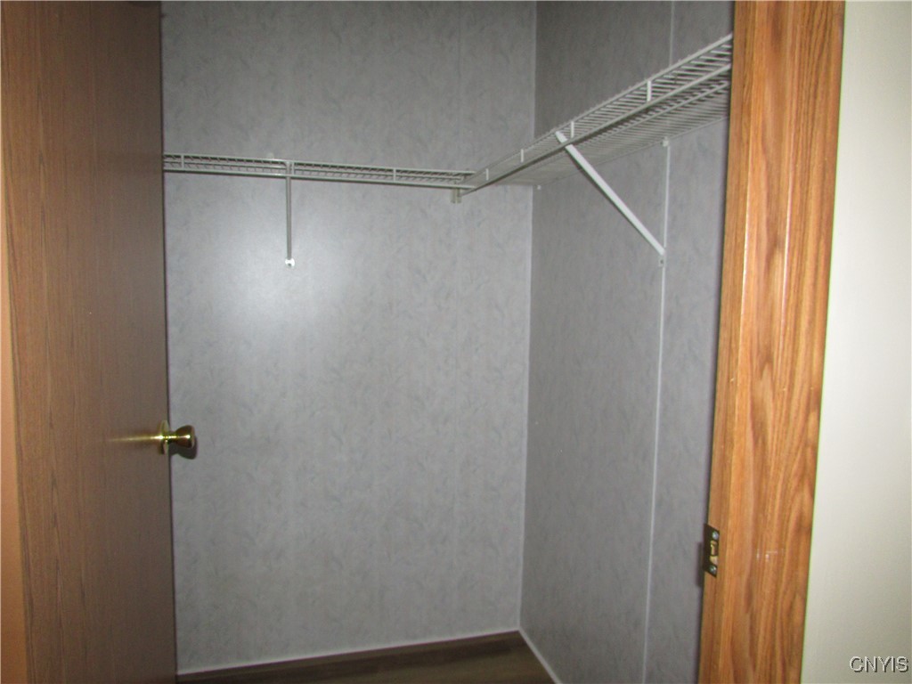 159 Rathburn Road Granby, NY 13069 - Photo 12 of 22 Walk in closet for the primary bedroom.
