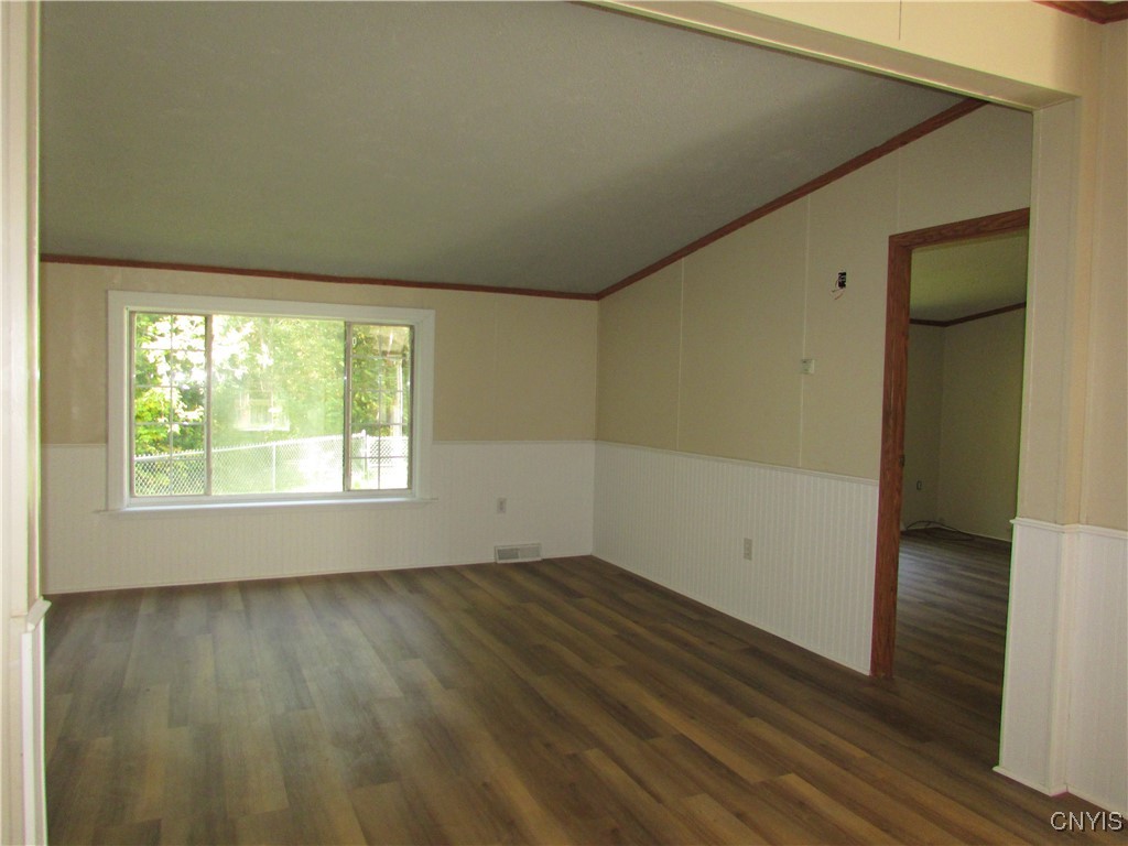 159 Rathburn Road Granby, NY 13069 - Photo 3 of 22 The large living room with primary suite to the ri