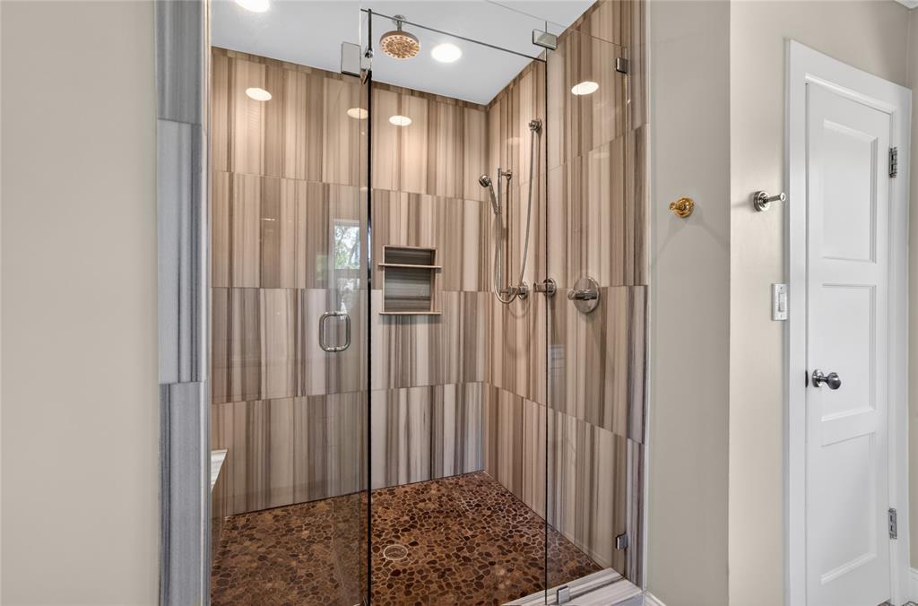 4009 Prescott Avenue Dallas, TX 75219 - Photo 21 of 39 Overhead shower, marble and stone pebble flooring in this huge shower