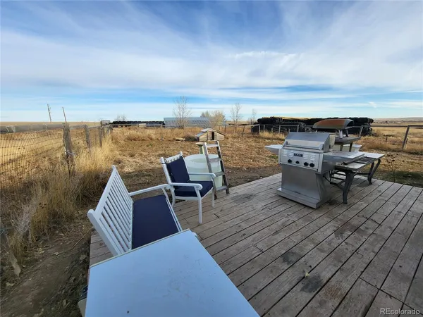 a view of a terrace with seating area