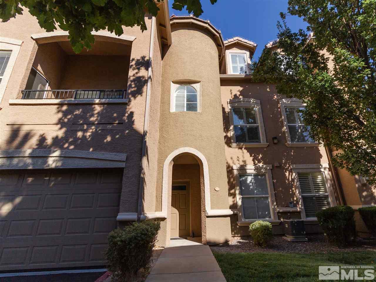 9050 Double R, Unit 1925 Reno, NV 89521 - Photo 25 of 25 a front view of a house with a garden