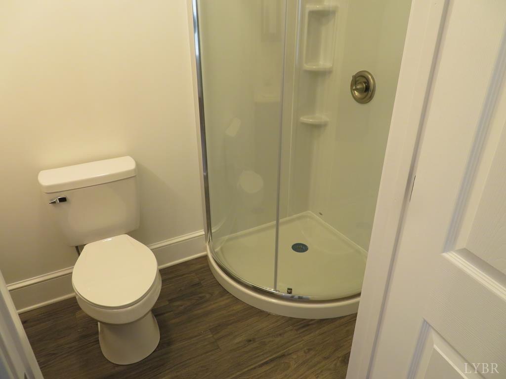 2961 Cotton Patch Road Gretna, VA 24557 - Photo 11 of 24 a bathroom with a toilet and a shower
