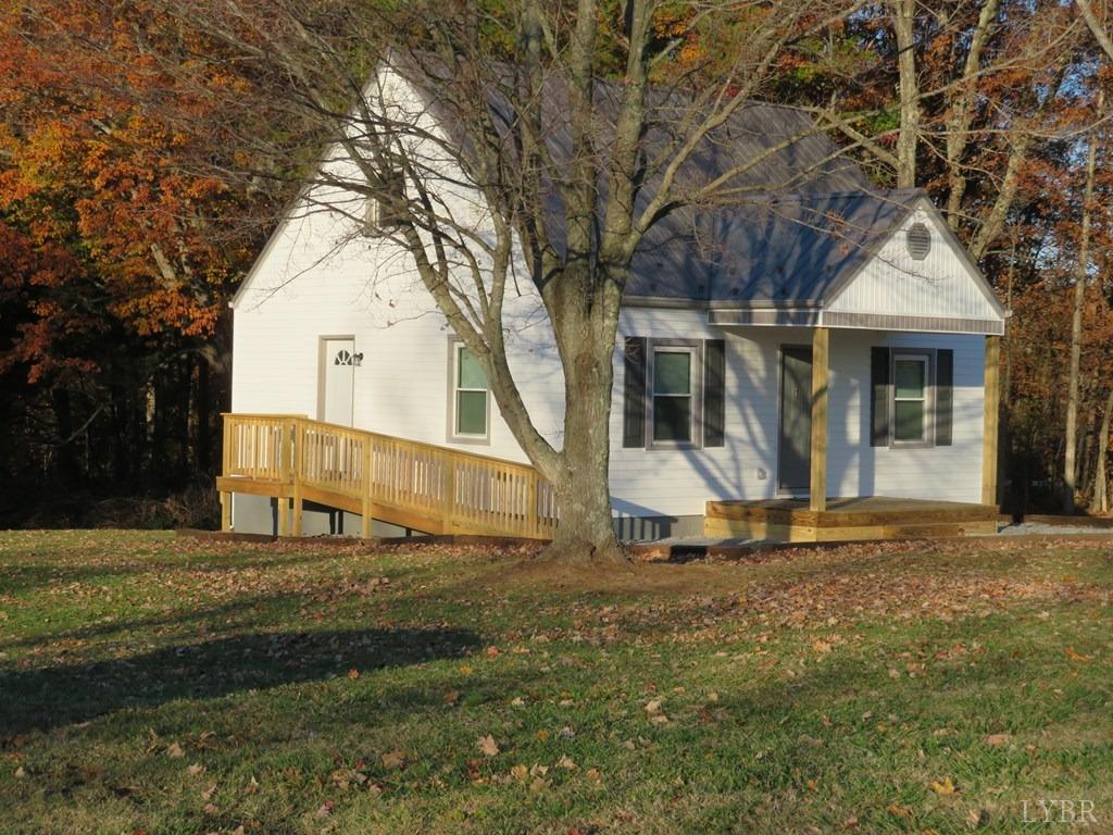 2961 Cotton Patch Road Gretna, VA 24557 - Photo 2 of 24 a front view of a house with a yard