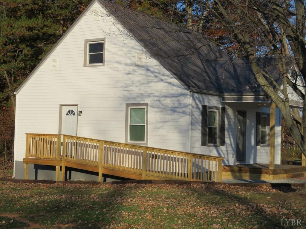 2961 Cotton Patch Road Gretna, VA 24557 - Photo 3 of 24 a view of a house with a yard