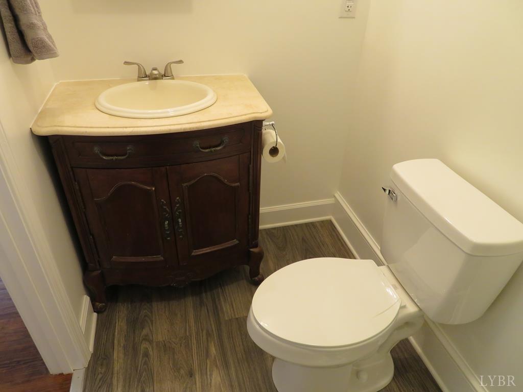 2961 Cotton Patch Road Gretna, VA 24557 - Photo 10 of 24 a bathroom with a sink and a mirror