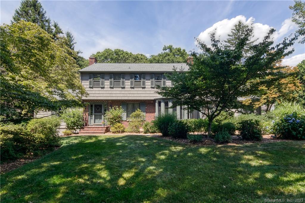 38 Beaver Pond Road Madison, CT 06443 - Photo 1 of 1 a front view of a house with a yard