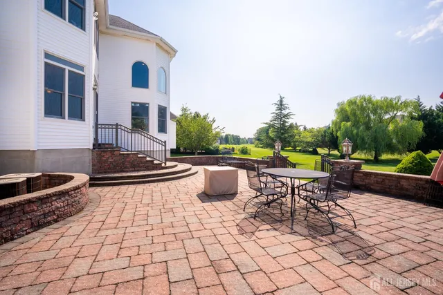a living room with furniture window and wooden floor