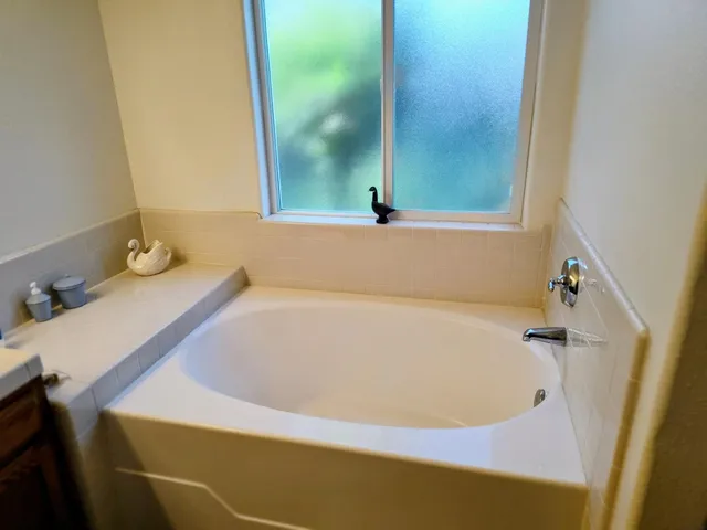 a bathroom with a bathtub