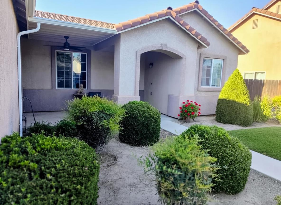 2846 Edgar Avenue Sanger, CA 93657 - Photo 2 of 25 a front view of a house with a yard