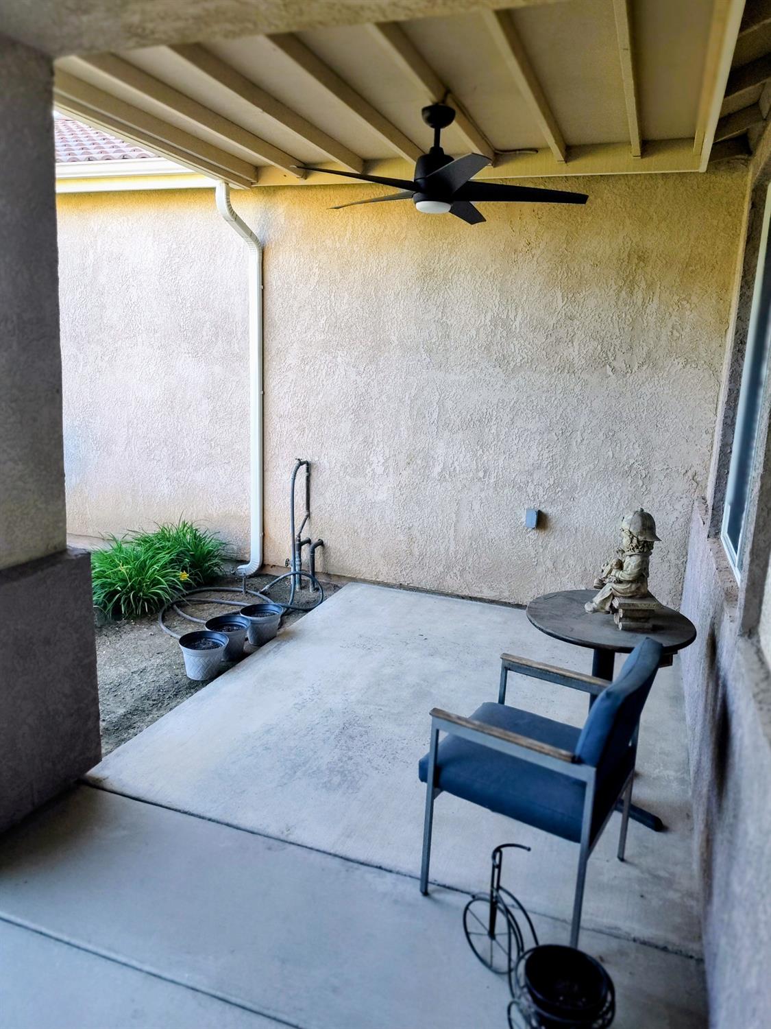2846 Edgar Avenue Sanger, CA 93657 - Photo 23 of 25 a view of a workspace with furniture and a window